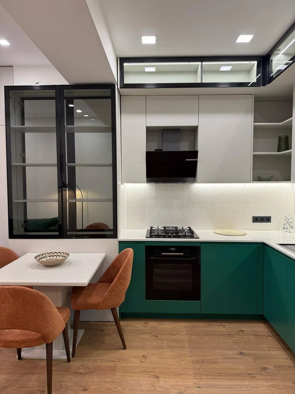 Green kitchen glazed partition — custom furniture by Kencho Group, Tbilisi