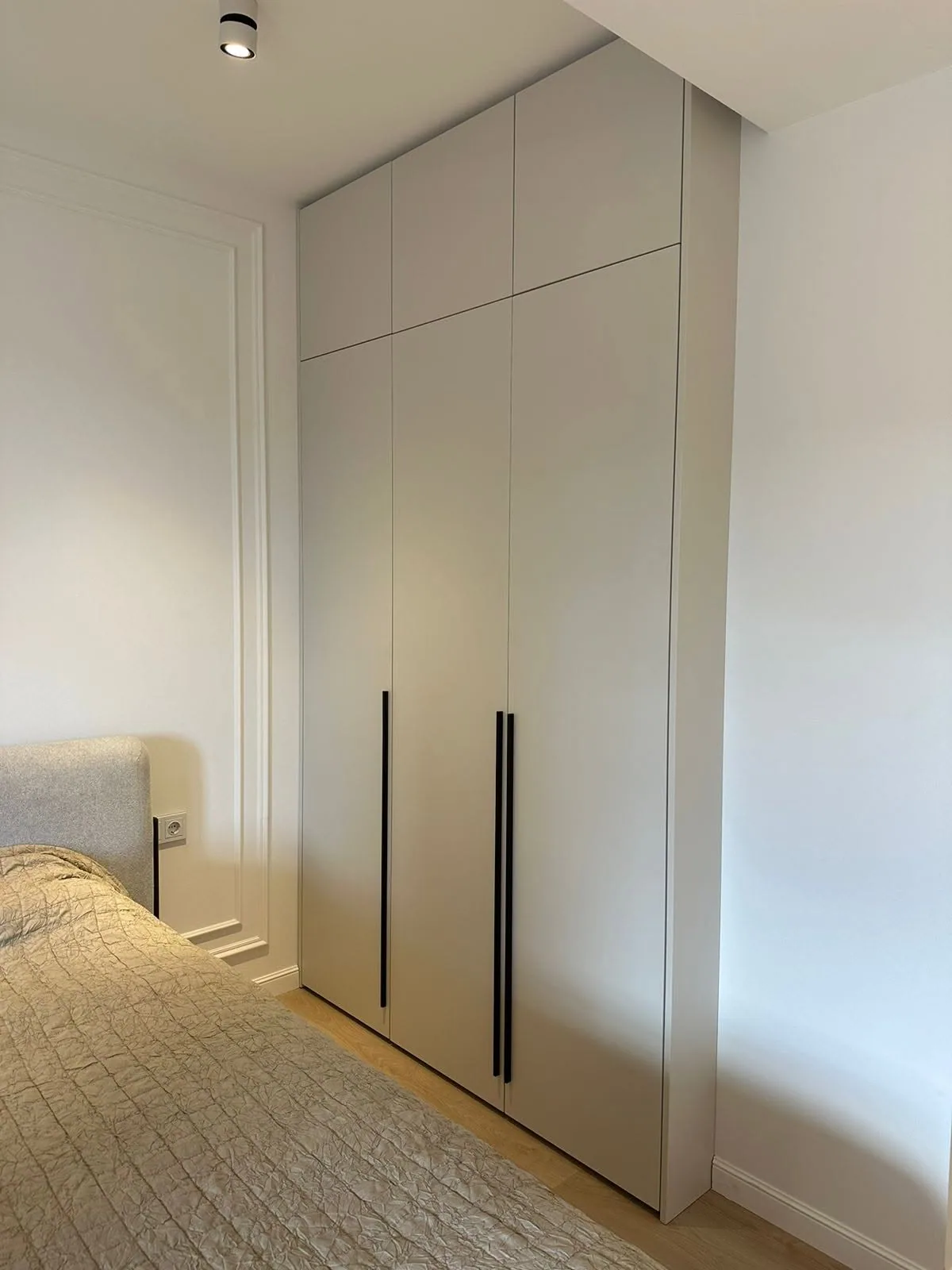 White bedroom wardrobe — custom furniture by Kencho Group, Tbilisi