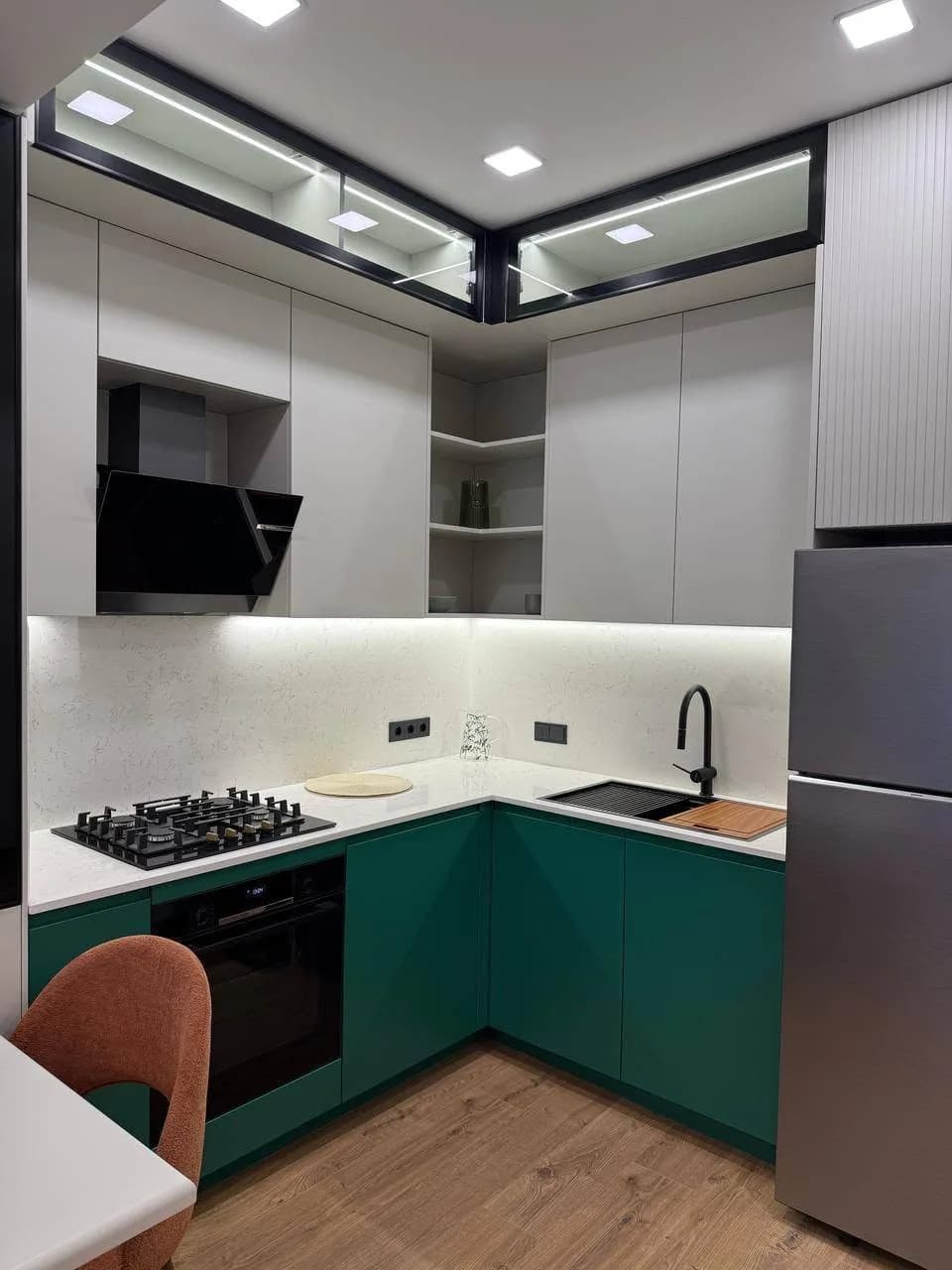Green corner kitchen — custom furniture by Kencho Group, Tbilisi