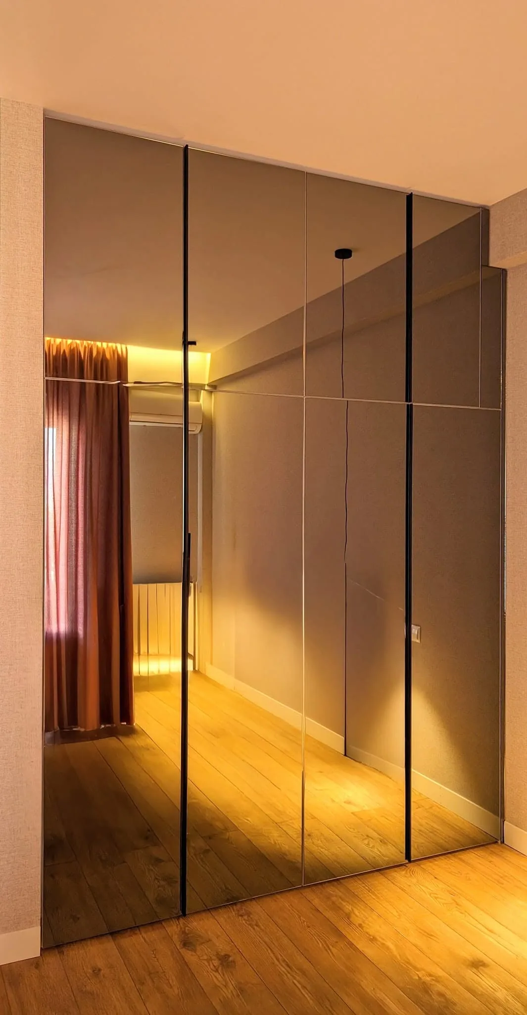 Bronze mirror wardrobe — custom furniture by Kencho Group, Tbilisi